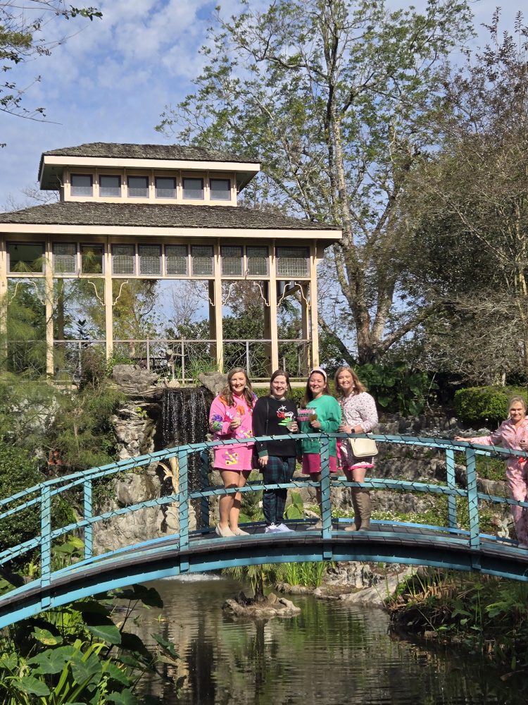 a group of people on a bridge