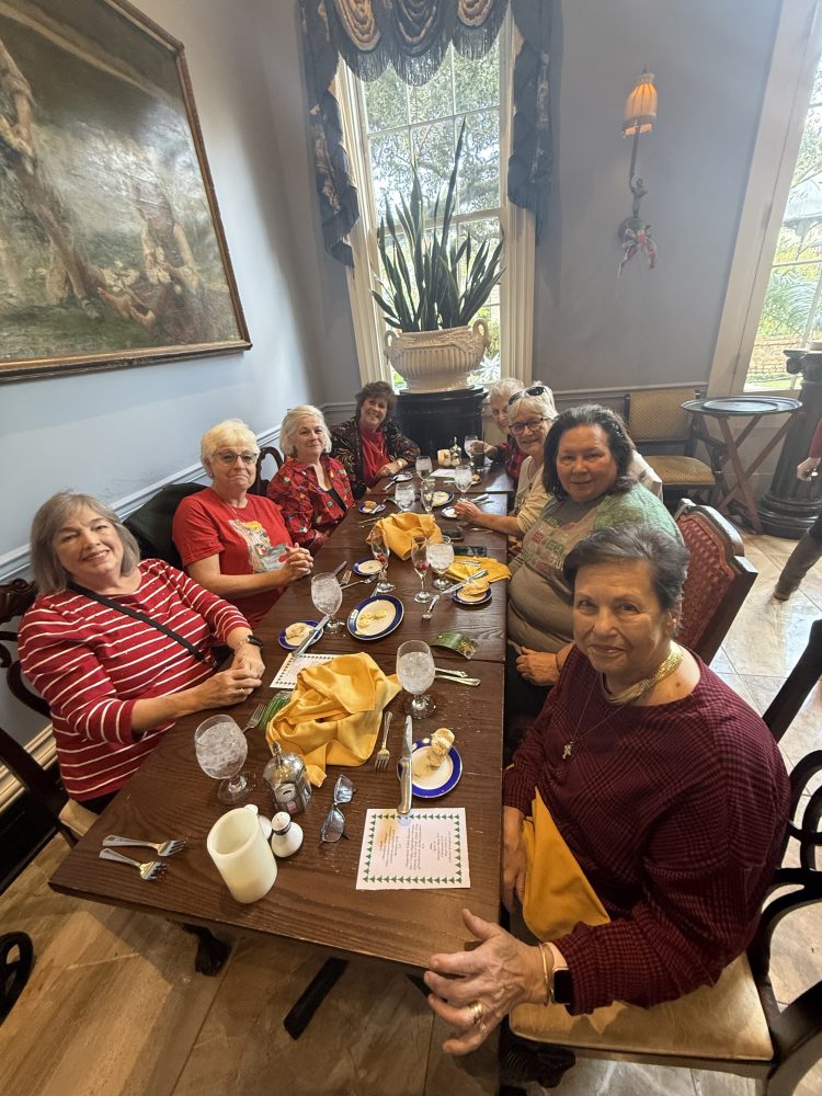 a group of people sitting at a table