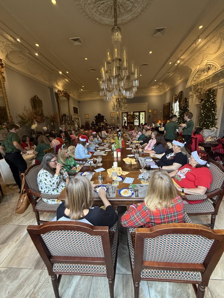 a group of people sitting at a table