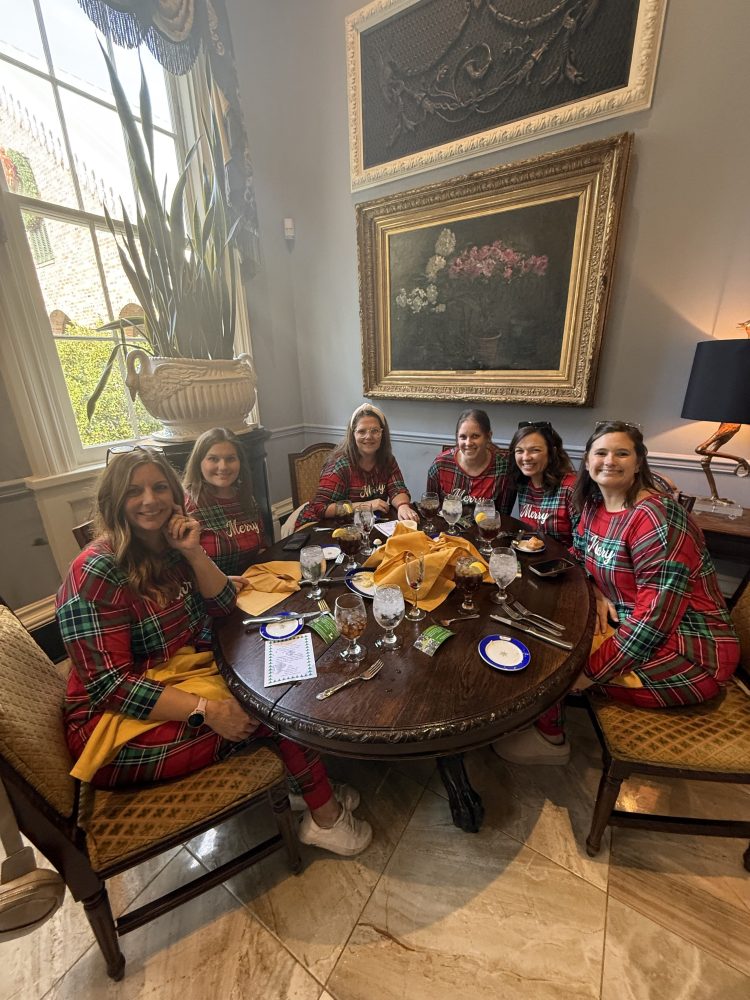 Mary O. Parker et al. sitting at a table