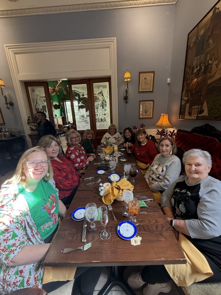 a group of people sitting at a table