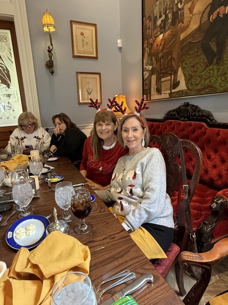 a group of people sitting at a table