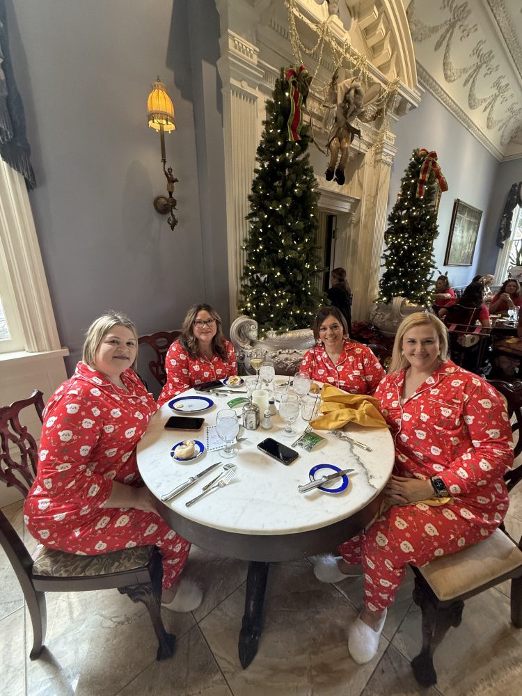 a group of people sitting at a table