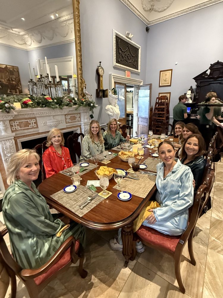 a group of people sitting at a table