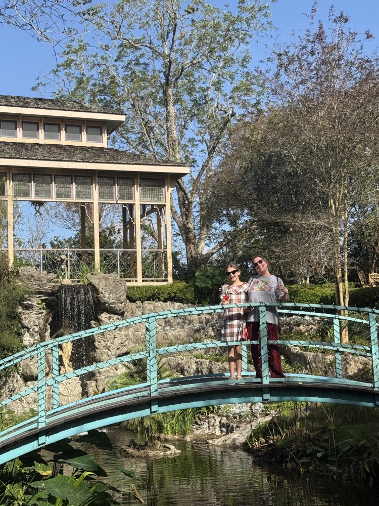 a group of people on a bridge