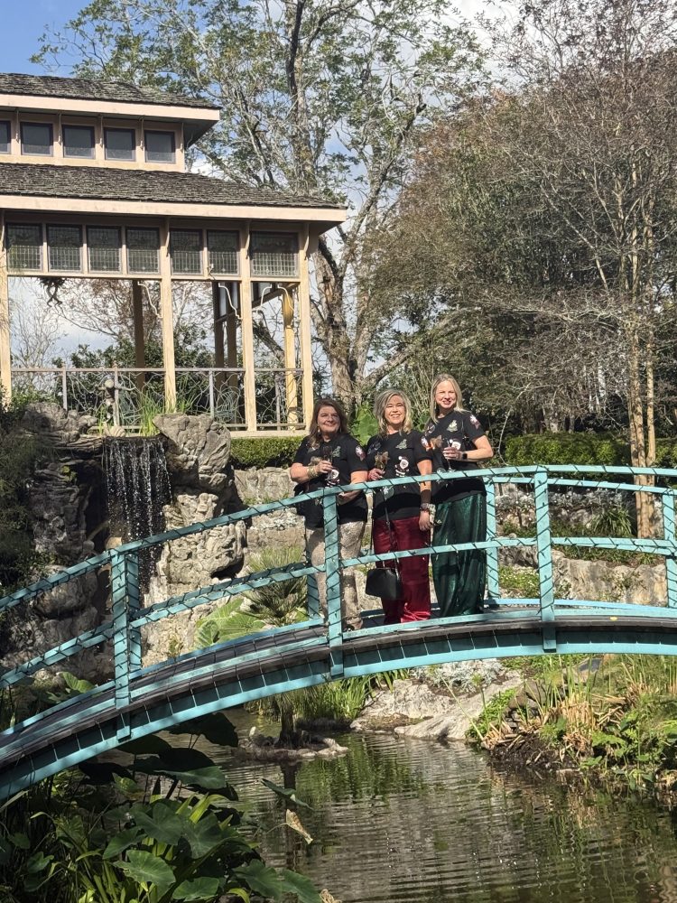 a group of people on a bridge